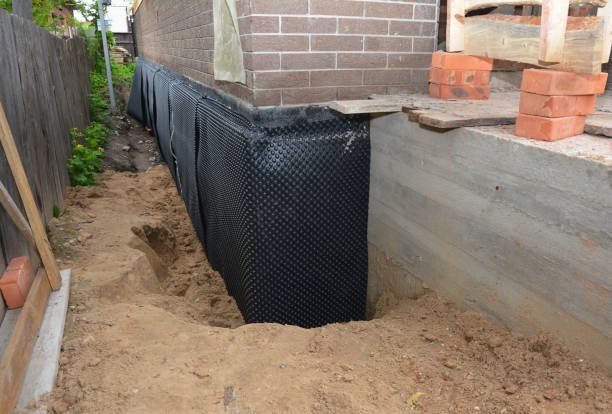 Happy homeowners after waterproofing job in Highlands